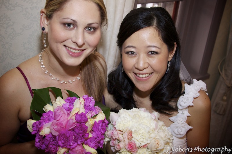 Bride with bridesmaid - wedding photography sydney